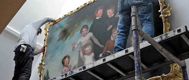 Painting being re-hung in the Guildhall banner
